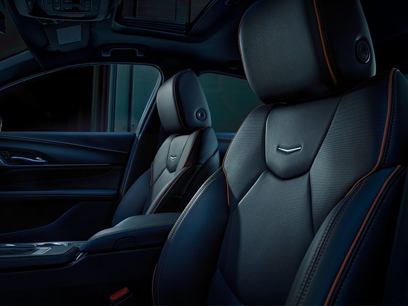 Driver's Front Row View of the 2026 CT4 Luxury Black Leather Seating with Red Trim