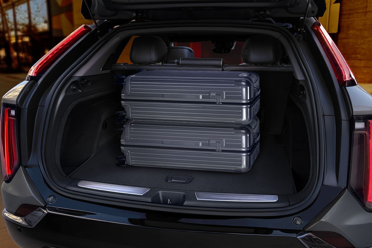 Close-up View of Luggage Stacked in the 2025 Cadillac OPTIQ Cargo Space