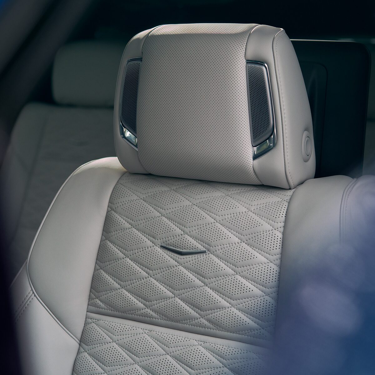Close-Up of the Speakers in a Seat Headrest of the 2026 Cadillac Escalade