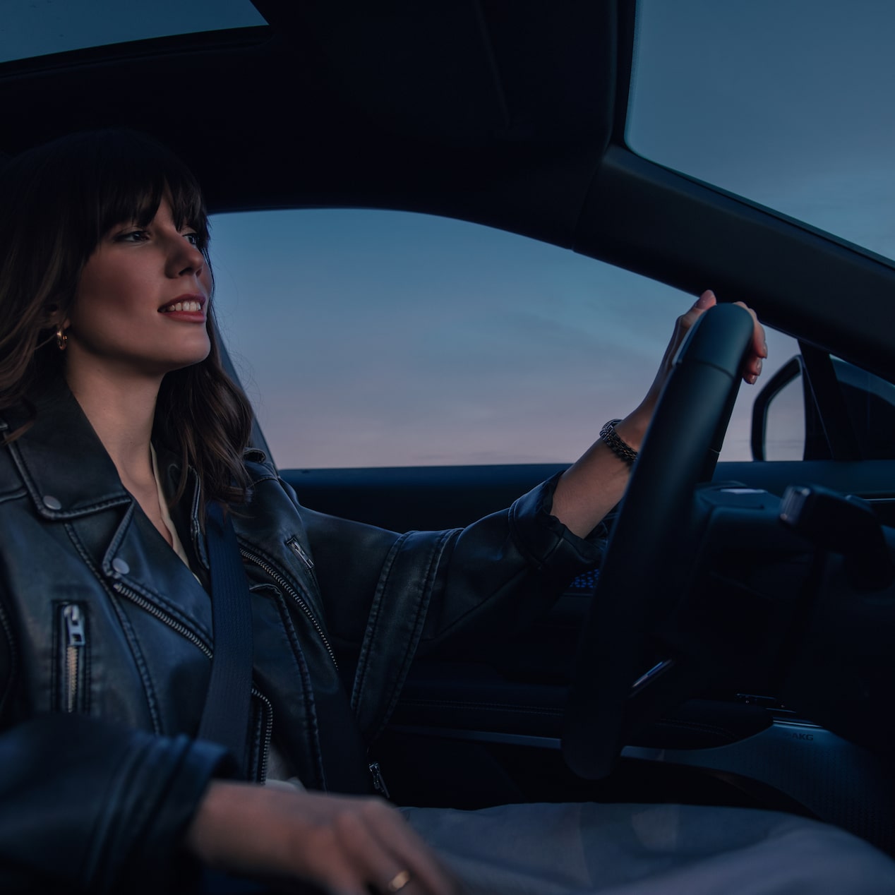 Woman Driving Cadillac LYRIQ
