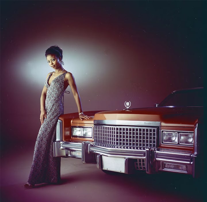 Woman with Cadillac.