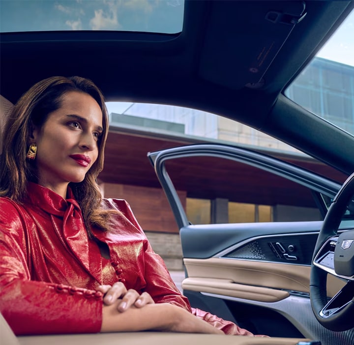 Woman with Cadillac.